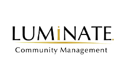 Luminate Community Management logo featuring the word ‘LUMINATE’ in bold black uppercase letters, with a gold lowercase ‘i’ and a gold underline swoosh, above the text ‘Community Management’ in a clean serif font on a white background